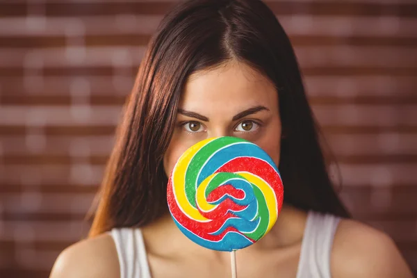 Pretty hipster with lollipop — Stock Photo, Image