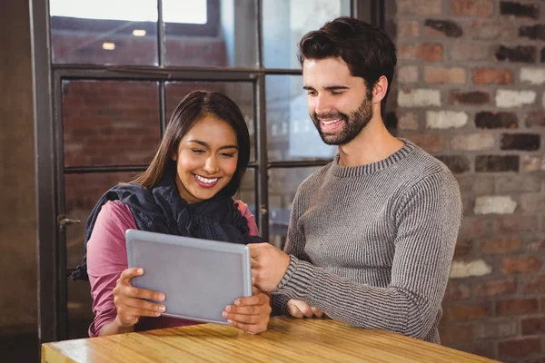 Couple looking at the tablet — Stock Photo, Image