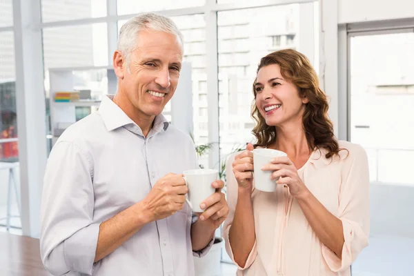 Business colleagues having coffee together — Stock Photo, Image