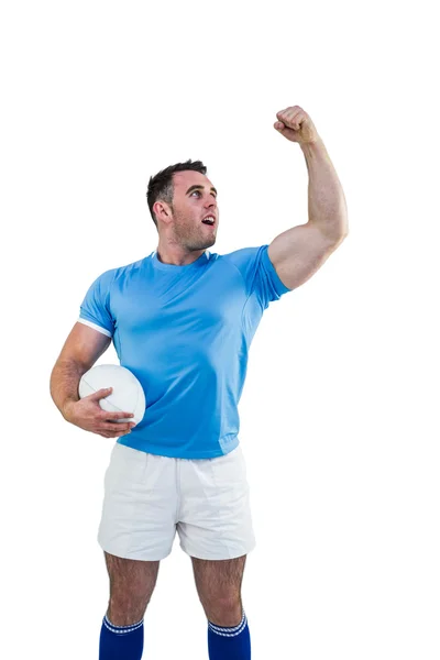 Jugador de rugby animando con la pelota — Foto de Stock