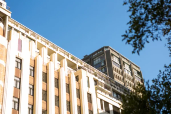 Blue sky over large building — Stock Photo, Image