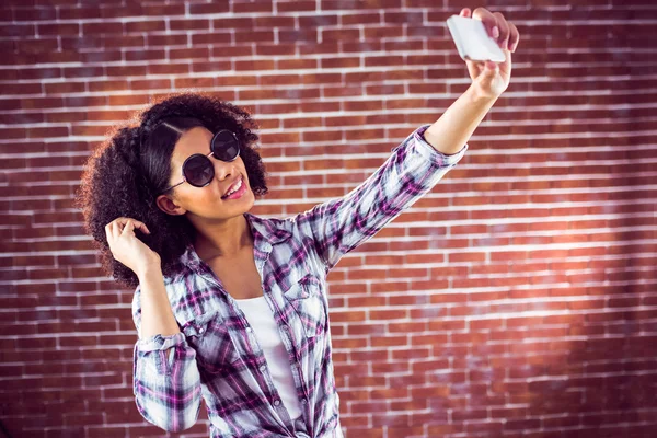 Attractive hipster taking selfie — Stock Photo, Image