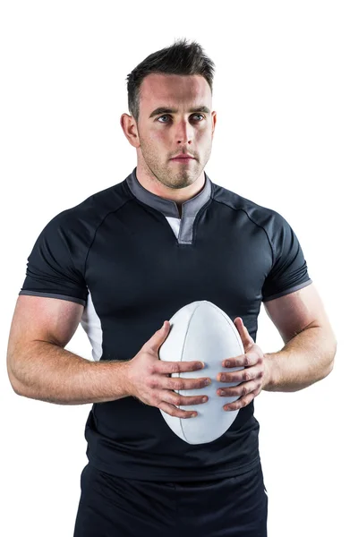 Jugador de rugby duro sosteniendo la pelota —  Fotos de Stock