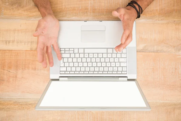 Businessman working on blank screen laptop — Stock Photo, Image