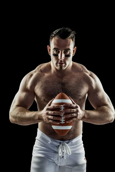 Shirtless American football player with ball — Stock Photo, Image