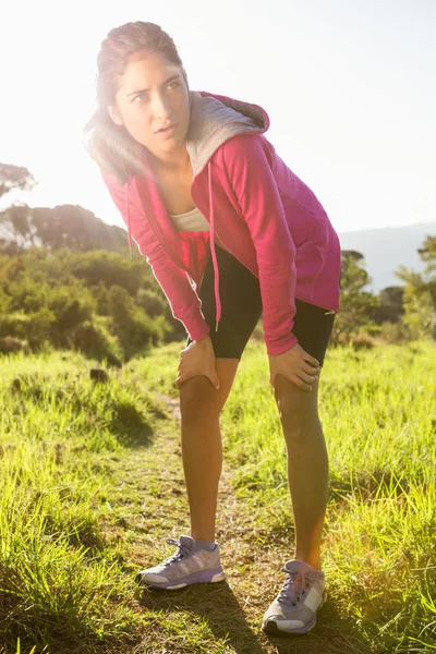 Breathing athletic brunette resting — Stock Photo, Image