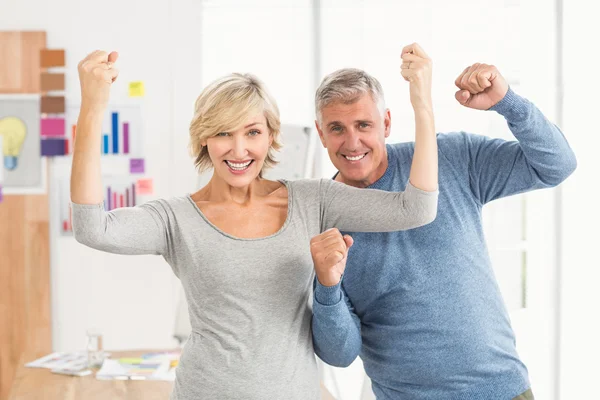 Business colleagues gesturing victory — Stock Photo, Image