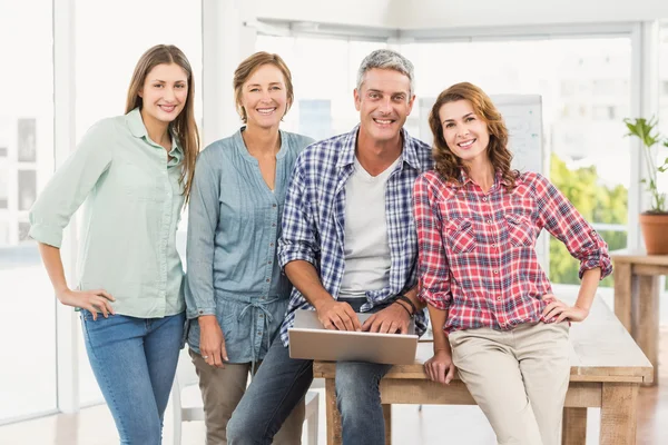 Business team having a meeting using laptop — Stock Photo, Image