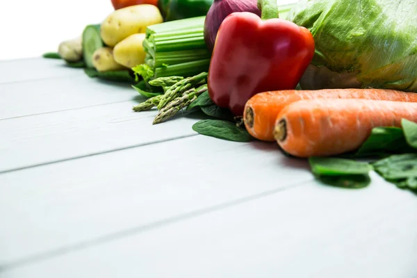 Line of vegetables on table — Stock Photo, Image