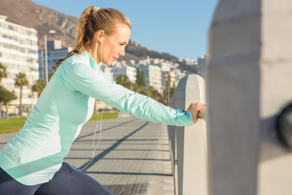 Fit blonde stretching — Stock Photo, Image