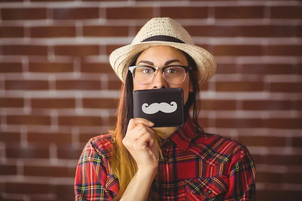 Hipster avec moustache sur portefeuille — Photo
