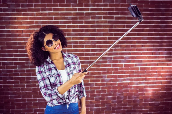 Attractive hipster taking selfie — Stock Photo, Image