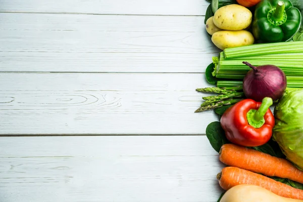 Line of vegetables on table — Stock Photo, Image