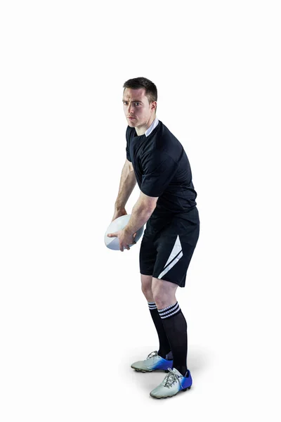 Rugby-Spieler vor dem Wurf eines Rugbyballs — Stockfoto