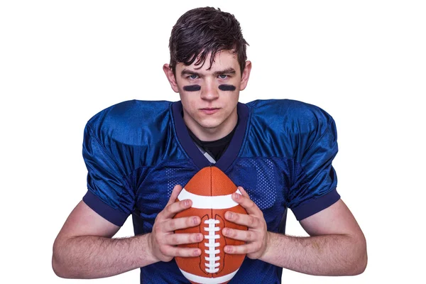 Football player holding a ball — Stock Photo, Image