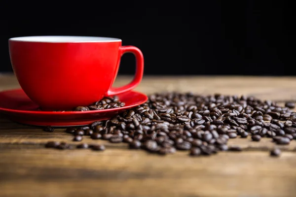 Beans on a table with cup — Stock Photo, Image