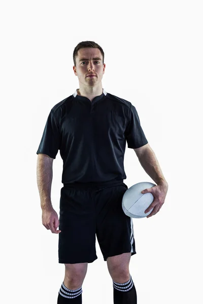 Jogador segurando uma bola de rugby — Fotografia de Stock