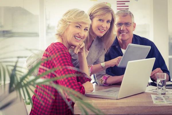 Smiling business team working — Stock Photo, Image