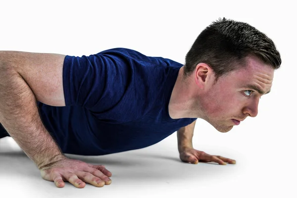 Přizpůsobit muž dělá push up — Stock fotografie