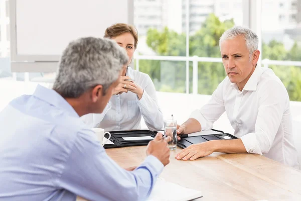 Business people talking and making arrangements — Stock Photo, Image