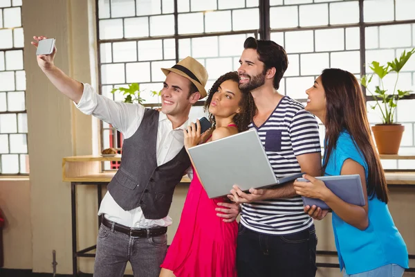 Grimacing friends taking selfies — Stock Photo, Image