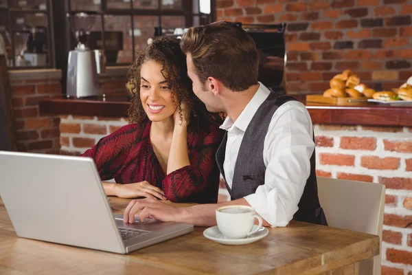 Couple on a date watching photos o — Stock Photo, Image