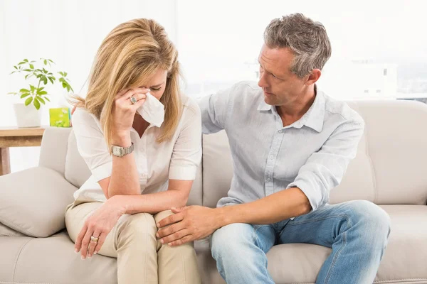 Therapist comforting crying female patient — Stock Photo, Image