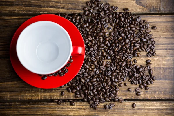 Beans on a table with cup — Stock Photo, Image