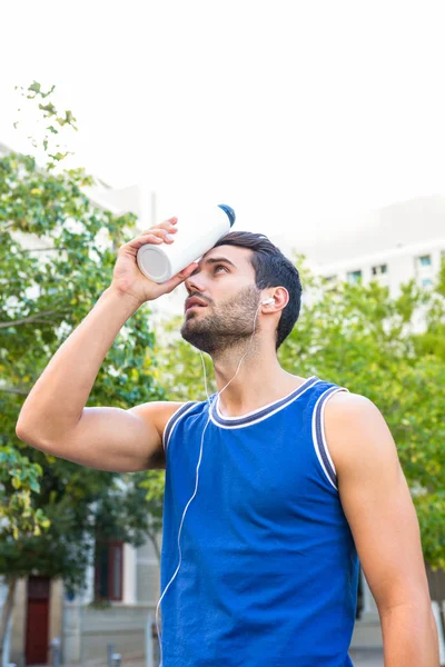 Handsome athlete cooling his forehead — Stock Photo, Image