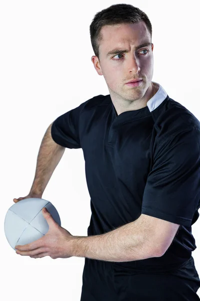 Jogador prestes a jogar uma bola de rugby — Fotografia de Stock