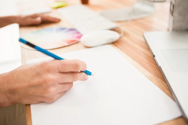 Hands designing with colour chart — Stock Photo, Image