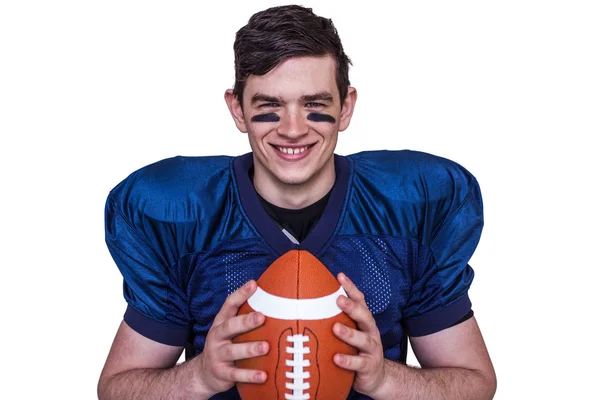 Football player holding a ball — Stock Photo, Image