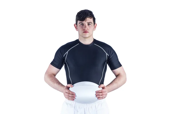 Jogador de rugby segurando uma bola de rugby — Fotografia de Stock