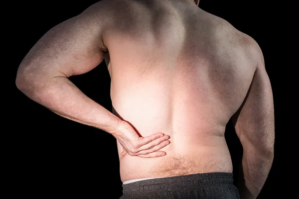 Acı arka ile vücut geliştirmeci — Stok fotoğraf