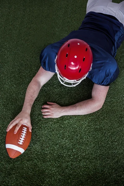 Jogador marcando um touchdown — Fotografia de Stock