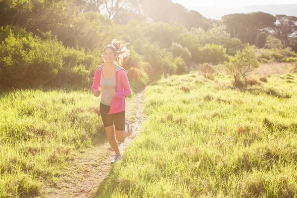 Passen vrouw joggen — Stockfoto