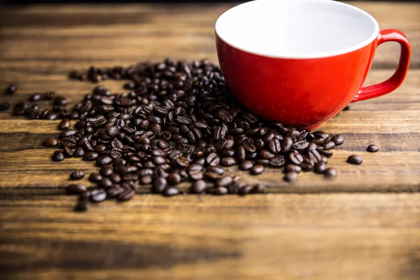 Beans on a table with cup — Stock Photo, Image