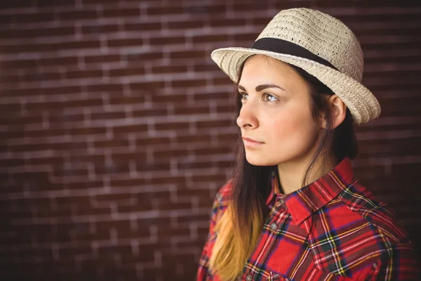 Mooie hipster in selectievakje shirt — Stockfoto