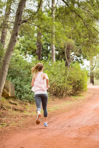 Atleta loira bonita jogging — Fotografia de Stock