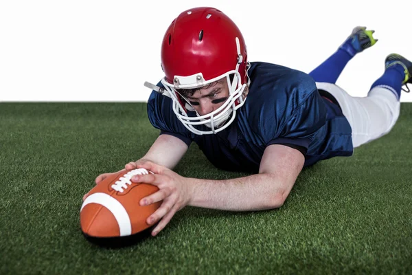 Jogador marcando um touchdown — Fotografia de Stock