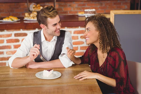 Couple feeding each other — Stock Photo, Image