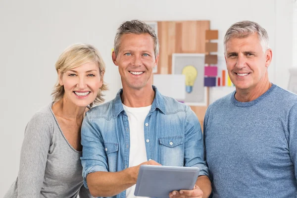 Colleagues working on a tablet — Stock Photo, Image