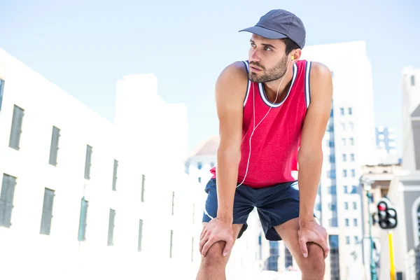 Atleet voorovergebogen — Stockfoto