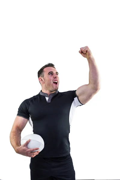 Joueur de rugby acclamant avec la balle — Photo