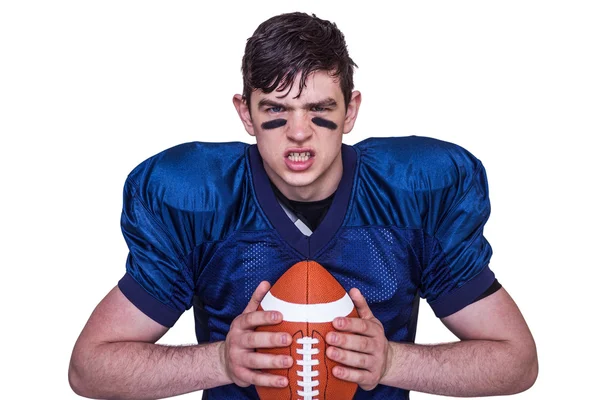 Football player holding a ball — Stock Photo, Image