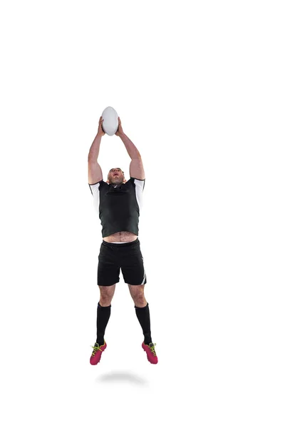 Jogador de rugby pegar a bola — Fotografia de Stock