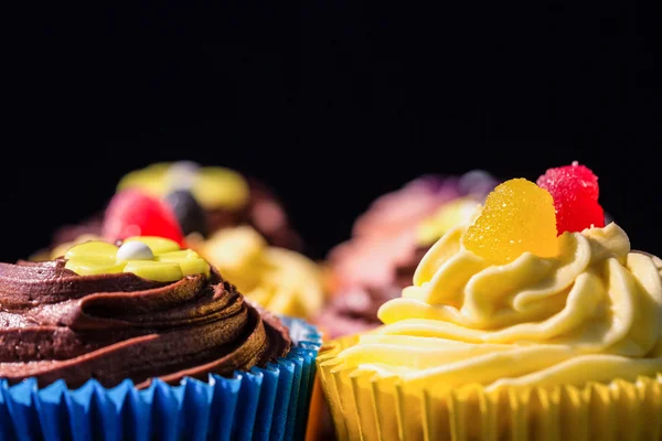 Delicious cupcakes on a table — Stock Photo, Image