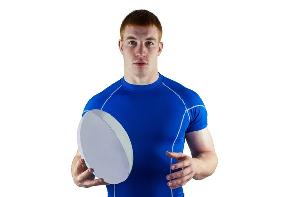 Rugby player holding rugby ball — Stock Photo, Image