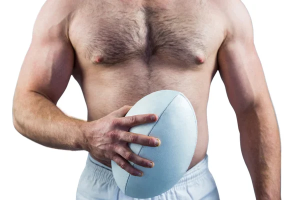 Jugador de rugby sin camisa sosteniendo pelota — Foto de Stock