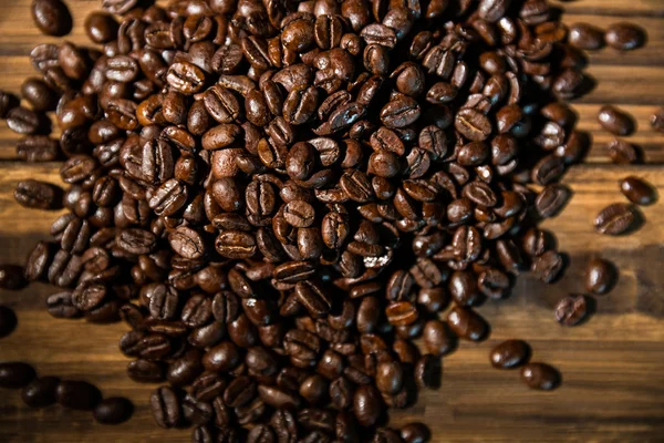 Coffee beans on a table — Stock Photo, Image